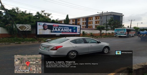 A well-positioned wall panel advertising board at Town Planning Way by Babatunde Oki Junction, Ilupeju, near Oshodi Market, offering strong visibility to passing traffic and pedestrians.