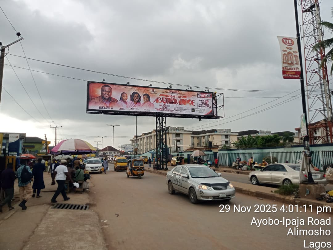 Gantry billboard on Ayobo-Ipaja Road by Magida Bus-Stop