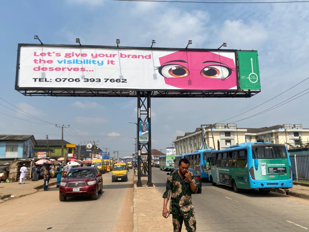 Gantry billboard on Ayobo-Ipaja Road by Magida Bus-Stop