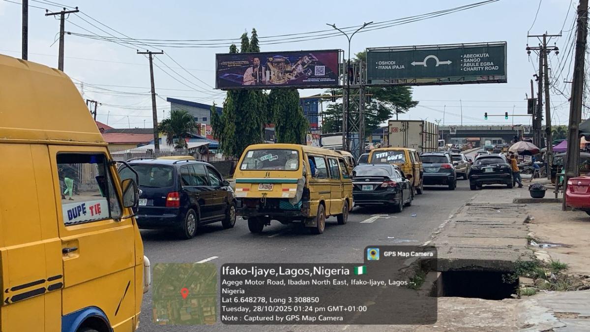 A strategically positioned overhead billboard located along the busy agege motor road axis in ifako-ijaye, lagos offering exceptional visiblity to heavy daily traffic flow, captures attention of motorists, commuters and pedestrians 